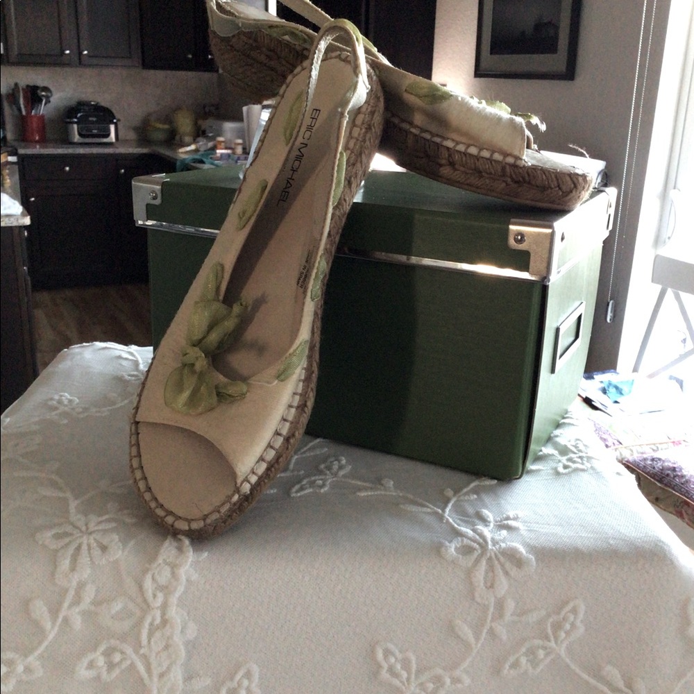 Eric Michael cream silk and leather kitten heel espadrilles.